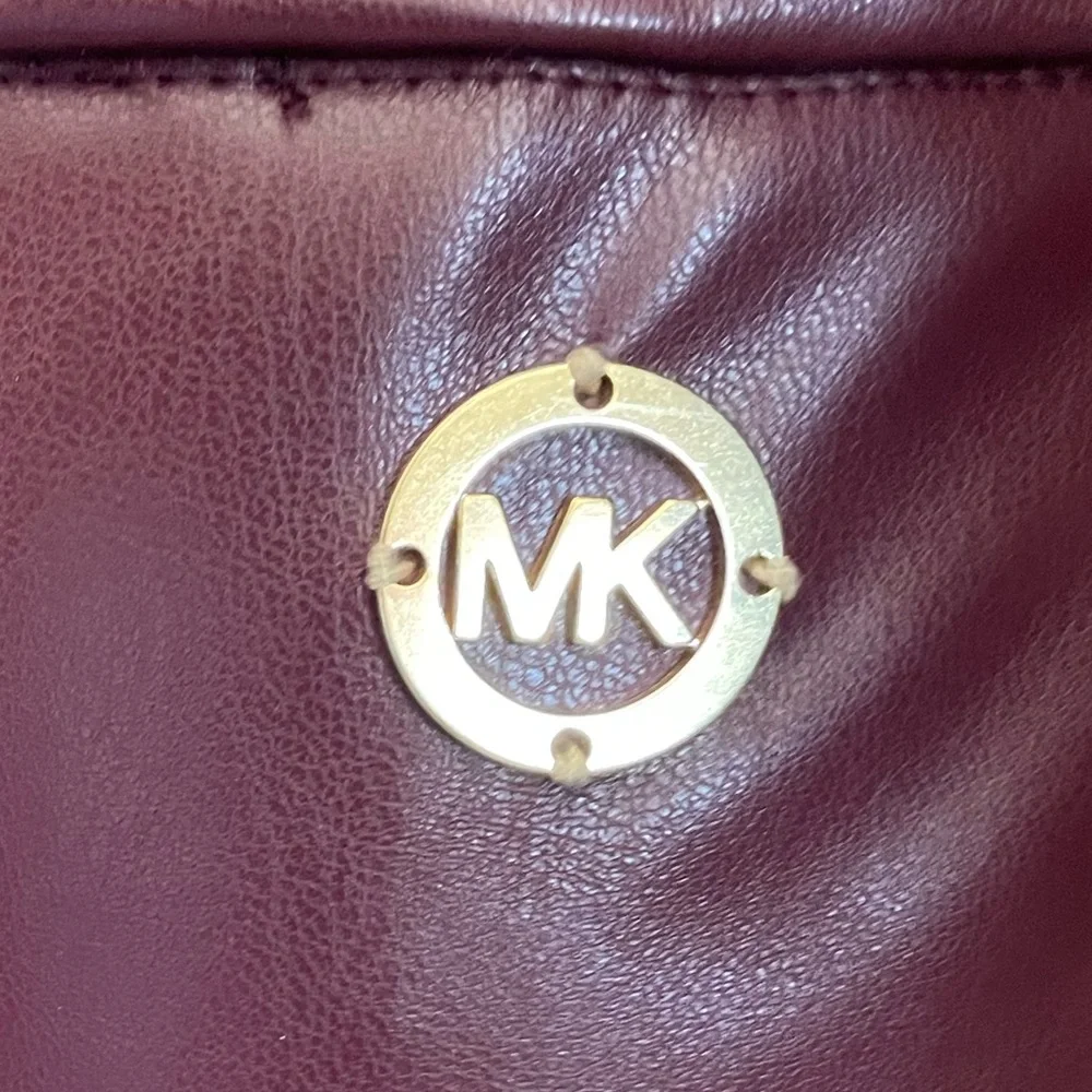 MK ankle length faux leather maroon pants size large Michael kors